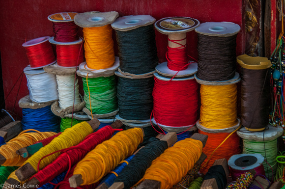 Colourful threads in the market.
