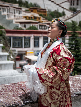 A gal posing in traditional Tibet outfit.