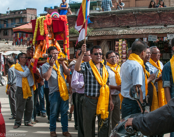 The men carrying the Buddha.
