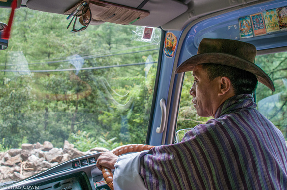 Our driver, and an amazing job on the mountain passes.