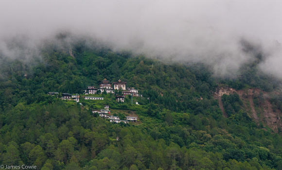 A close-up of the same monastery. Clouds moving in.