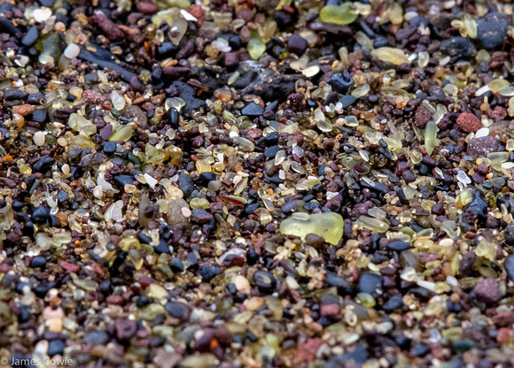 Green Olivine left behind after volcanic activity and erosion from the surf.