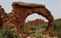 Some ruins and the intact wall of Fatehpur Sikri Fort