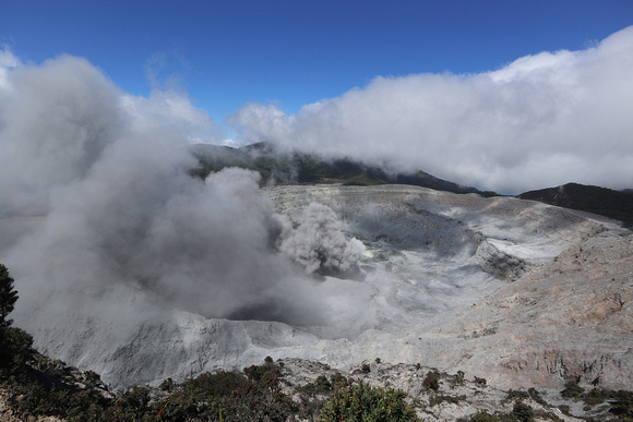 Wide shot of the mile wide crater, of the erupting Poas Volcano.