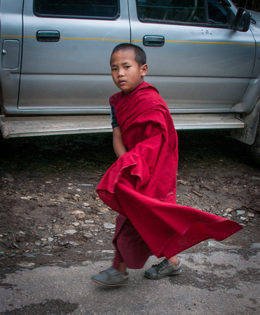 Young Monk headed to the Tigers Nest monastery.